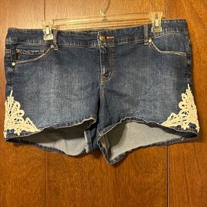 Torrid Denim shorts with lace on each side
